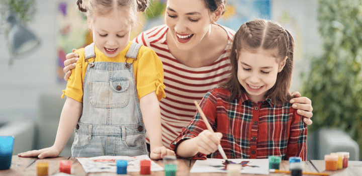 Mother is proud and supportive of her daughters's painting