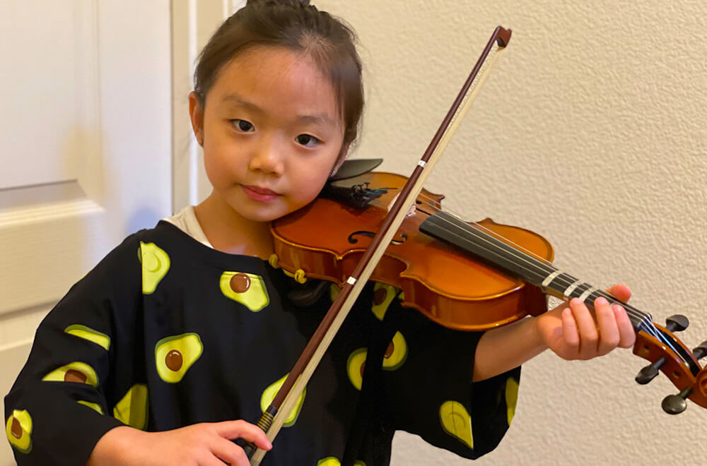 Zoe playing the violin