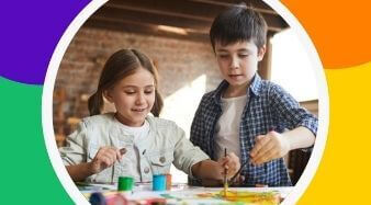 two kids painting with acrylic painting