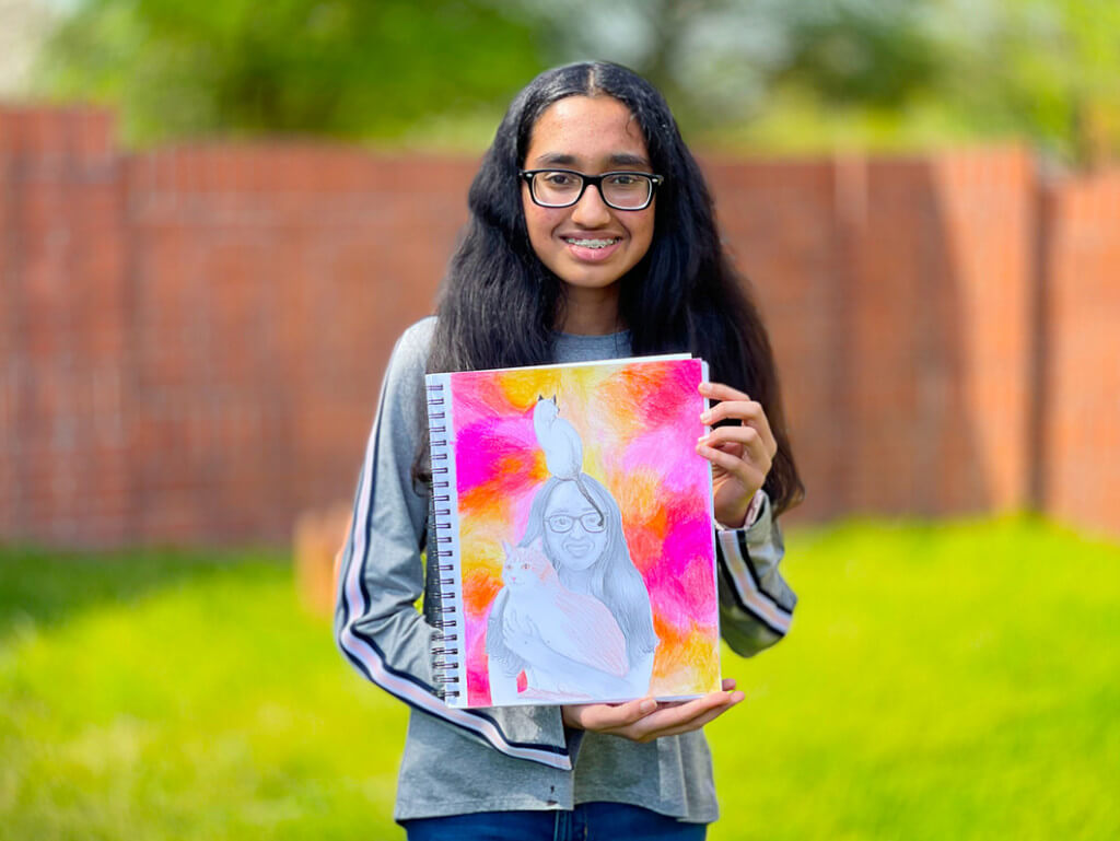Sruthi's self-portrait created from her own reference picture and her own idea for the background.