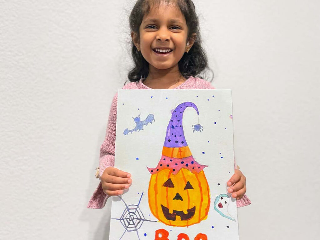Watercolor painting of a jack-o-lantern pumpkin at nline art classes by Nimmy