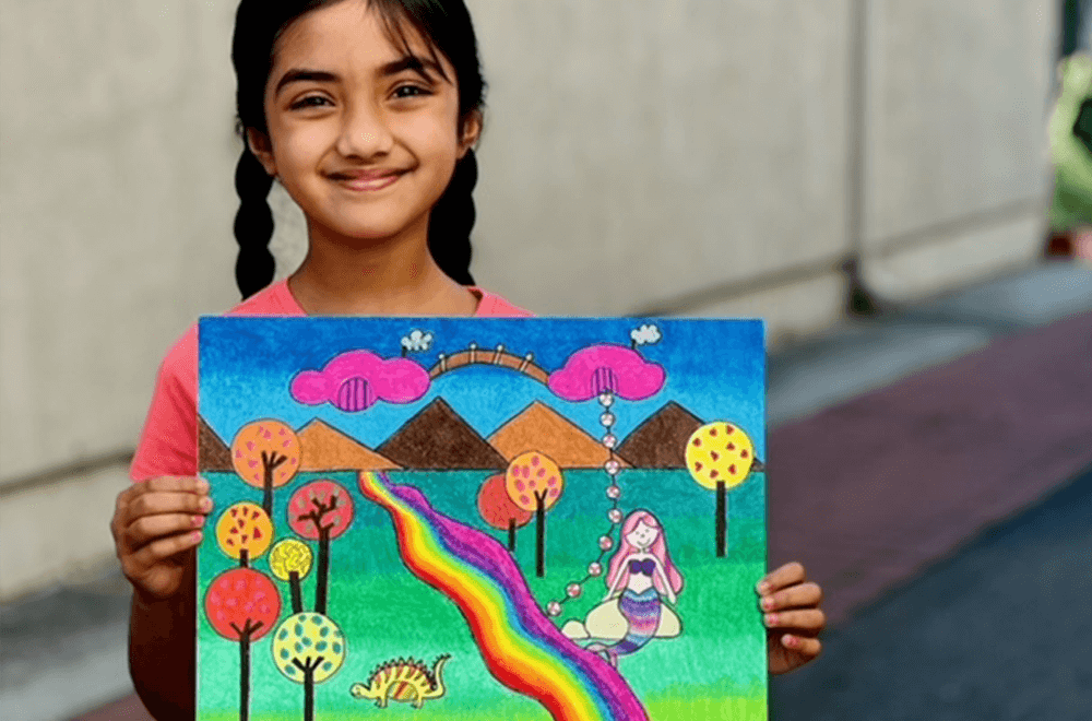 Ria's own ideas in a rainbow painting