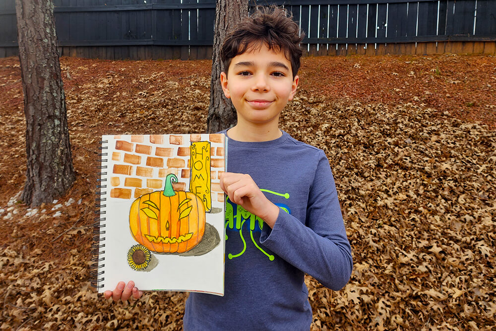 A watercolor painting of a pumpkin with a sunflower, created by a boy in Nimmy's Art online class.