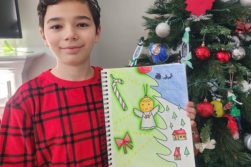 A beautiful watercolor Christmas painting created by a boy in Nimmy's Art holiday art classes.