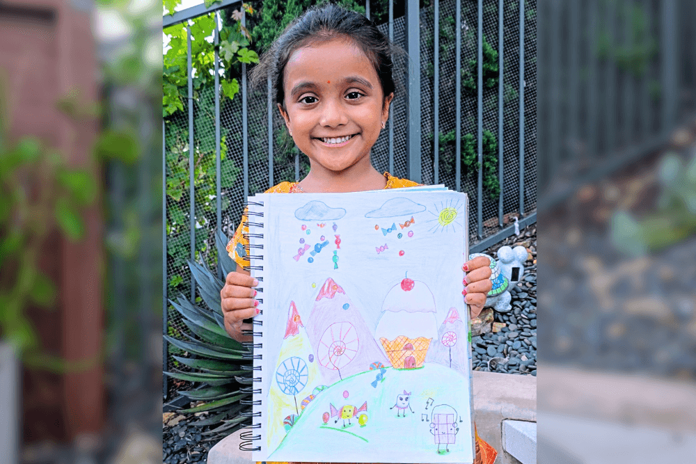 Aanya holding her Acrylic Painting - Rainbow Stacking Toy - (Still Life Study)