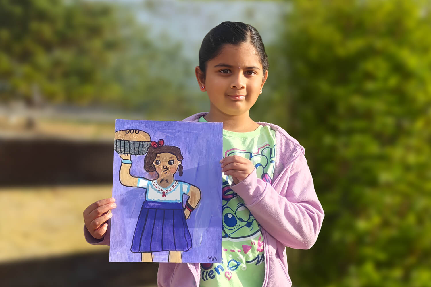 Young artist Mithra holding her acrylic painting of Luisa carrying a big pumpkin pie, illustrated with bold outlines and a purple background.