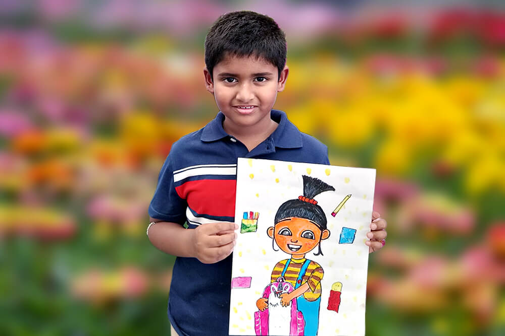 Sarthak, a young artist, proudly holds his acrylic painting titled “Agnes with Backpack.” The artwork features Agnes from Despicable Me smiling brightly while holding her backpack, surrounded by colorful school supplies and playful details that capture her cheerful personality.
