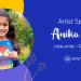 Anika with the Owl painting in the cover page